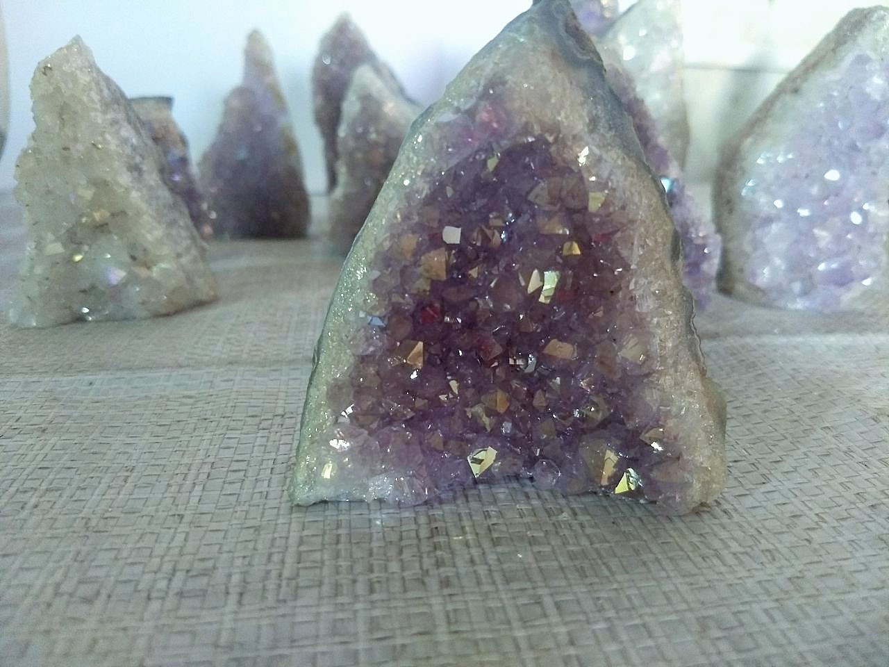 Stones from Uruguay - Angel Aura Quartz Crystal Titanium Coating Amethyst  Cut Base 